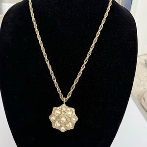 Long gold tone with pearl pendant